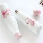 bouteille thermos élégante avec fleurs