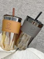 gourde design en verre avec paille